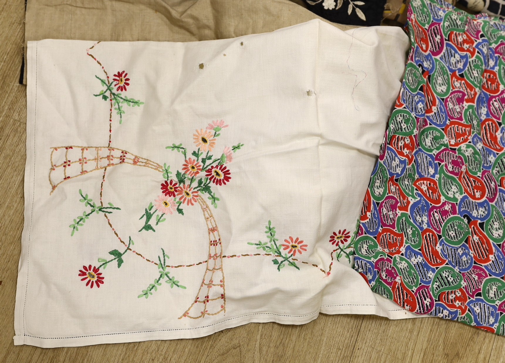 Various lengths of 1940's and later crepe, a large beaded edged cover and other fabrics, etc.
